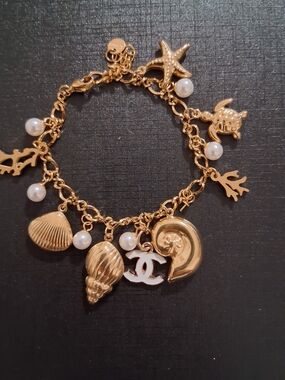 Gold And White Sea-Theme Charm Bracelet with Faux Pearls